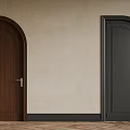 Brown And Black Arched Hinged Doors With Brass Handles On Light Wall Wooden Floor