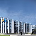 Modern Industrial Factory Building Exterior With White Facade And Glass Curtain Wall Design