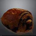 Freshly Baked Red Croissant with Shiny Golden Surface and Soft Flaky Layers