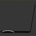 Sleek Modern Laptops With Colorful Screens And Wireless Mouse On Reflective Surface