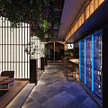 Traditional Japanese Restaurant Interior with Wooden Bar Counter Dining Tables and Green Plants