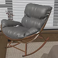 Bedroom Interior With Gray Leather Rocking Chair Window Blinds And Beige Headboard