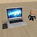 Sleek Laptop With Glowing Screen External Dock And Astronaut Figurine On Wooden Table