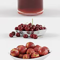 Fresh Cherries and Plums with Fruit Tea in Glass Pitcher and Bowls