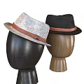 Mannequins Wearing Stylish Gray And Black Hats With Brown Leather Bands