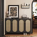Stylish Black Rattan Panel Shoe Cabinet With Gold Handles And Decorative Items