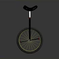 Stylish Unicycle with Black Seat Yellow Spokes and Red Pedals