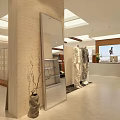 Modern Clothing Store Interior Design With Spacious Layout Reception Desk And Leather Sofa