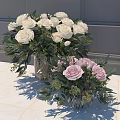 White and Pink Roses in Transparent Glass Vase with Green Leaves and Branches