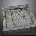 Damaged Square Concrete Structure With Scattered Debris And Broken Edges