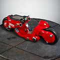 Red Motorcycle With Black Seat Logos And Circular Parts On Circular Metal Platform