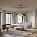 Modern Circular Living Dining Room With White Sofa Round Coffee Table Brown Chair And Chandelier