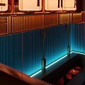 Cozy Bar Interior Design With Warm Pendant Lights Wooden Dividers And Seating Areas