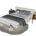 Modern Upholstered Double Bed With Striped Blanket Pillows Bedside Table And Round Rug