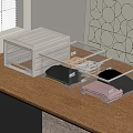 Three Transparent Storage Boxes with Gold Frame for Desk Organization on Wooden Table