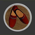 Red Loafers with Metallic Accents Displayed on White Pedestal with Wooden Top