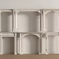 Ornate White Decorative Mantel Frames With Various Arch Designs And Wooden Floor