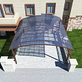 Modern Metal Frame Canopy With Transparent Roof Over Building Entrance And Stone Wall