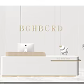 Modern Elegant White Reception Desk With Computer Sculpture Gold Lettering And Potted Plant
