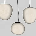 Three White Rounded Pendant Lights Hanging With Black Cords On Gray Wall 3d model