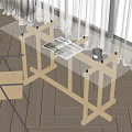 Modern Glass Top Desk With Wooden Legs Magazine And Cup Near Chair