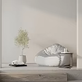 Soft Light Minimalist Interior Featuring Bean Bag Chair Potted Plant and Side Table 3d model