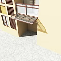 Modern Glass Canopy Structure Installed Above Windows On Yellow Building Exterior