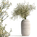 White Textured Vase With Fresh White Small Flowers For Home Interior Decor