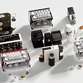Various Modern Kitchen Appliances Including Coffee Machines And Capsules