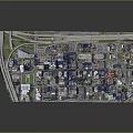 Aerial View of Modern City with Skyscrapers and Urban Street Layout