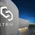Modern STRIM Building Exterior With Hexagonal Logo And Illuminated Striped Curved Facade