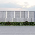 Modern Garden Feature Wall With Stone Panels Pillars And Flower Bushes
