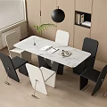 Modern Dining Table Set With Marble Top Black White Chairs Green Plant And Pendant Light