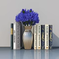 Golden Vase With Purple Flowers And Art Architecture Books On Gray Modern Tabletop