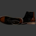 Lace up leather boots black and brown with detailed sole reflective surface on dark background