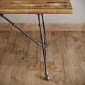 Rustic Wooden Dining Table With Metal Brackets Legs On Wooden Floor Interior