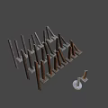 Rusty Metal Piles As Defensive Weapons With Concrete Bases Standing And Slanting
