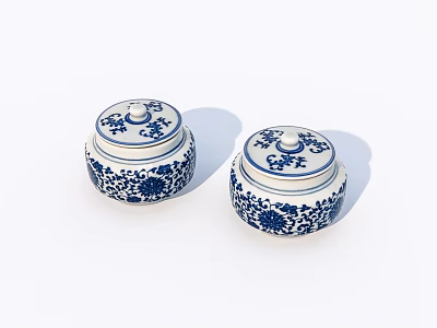 Pair of Blue and White Ceramic Jars With Floral Patterns and Lids 3d model