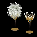 Banquet Hall Decoration with White Flower Bouquet and Golden Crown Ornament on Golden Stands