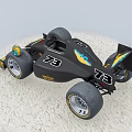 Black Formula Race Car With Yellow Blue Accents Number 73 And TOTAL Logo