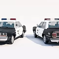 Police Functional Vehicles Displaying Emergency Lights POLICE Branding Front And Rear Views