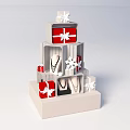 Multi Tiered Display Shelf With Red And White Gift Boxes And Decorative Ornaments