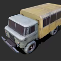 Vintage Green And Yellow Truck With Large Tires And Rustic Exterior Design