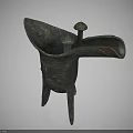 Traditional Bronze Drinking Vessel A Vintage Household Item With Three Legs And Intricate Carvings
