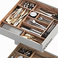 Cutlery Set Organized in Drawer with Wooden Dividers and Stainless Steel Utensils
