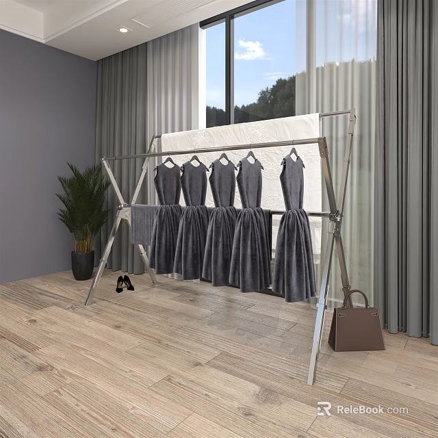 Standing Metal Clothing Rack With Gray Dresses Green Plant Shoes And Handbag 3d model 