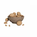 Healthy Organic Walnuts in a Ceramic Bowl with Some Scattered Outside