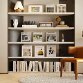 Modern Dark Brown Bookshelf With Books Photo Frames Decor Items And Brown Chair Floor Lamp