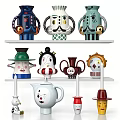Creative Human Shaped Ceramic Wares With Colorful Designs On Shelf