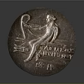Artistic Round Sculpture Featuring Seated Figure And Ancient Carved Inscriptions